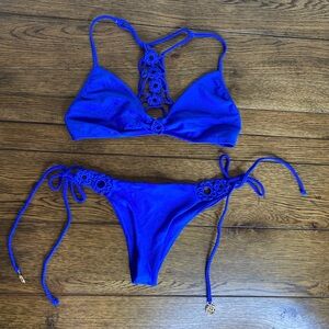 Luli Fama 2 piece swimsuit.